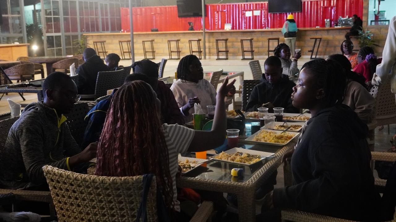 GIANTS campers sharing a meal together