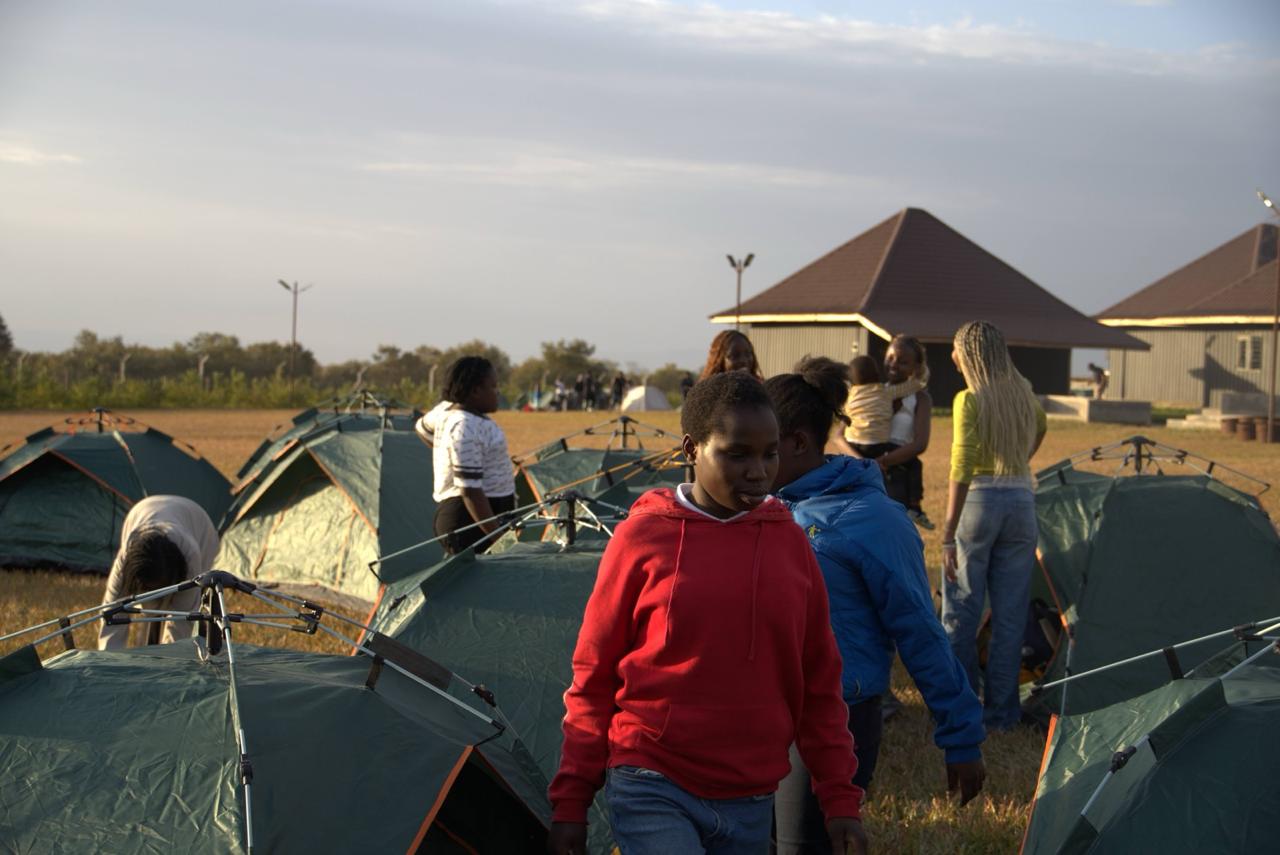 GIANTS campers among their tents at camp